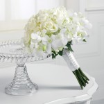 White bouquet of roses and stephanotis - wedding lusciousness